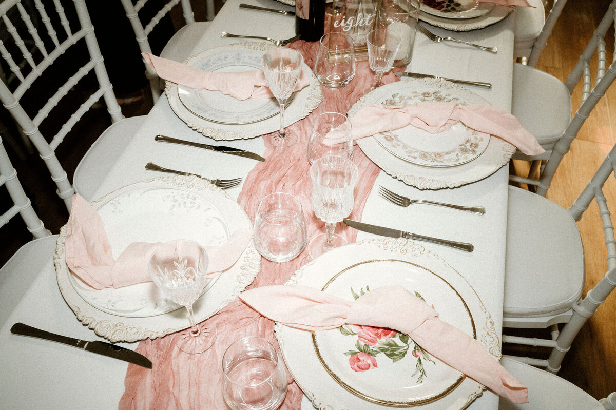 Table setting with blush linens